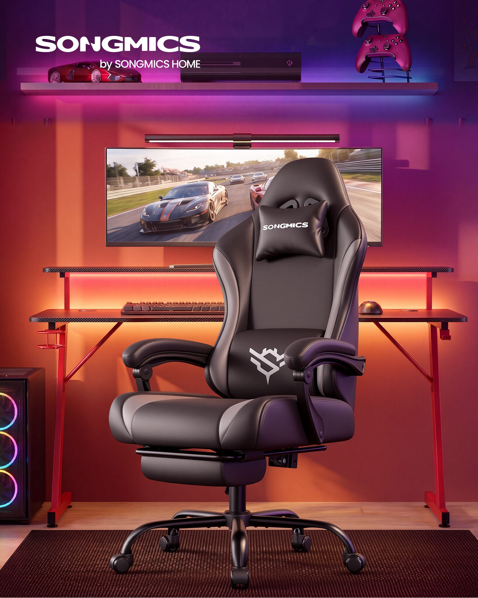 Ink black and slate grey gaming chair with footrest and lumbar support
